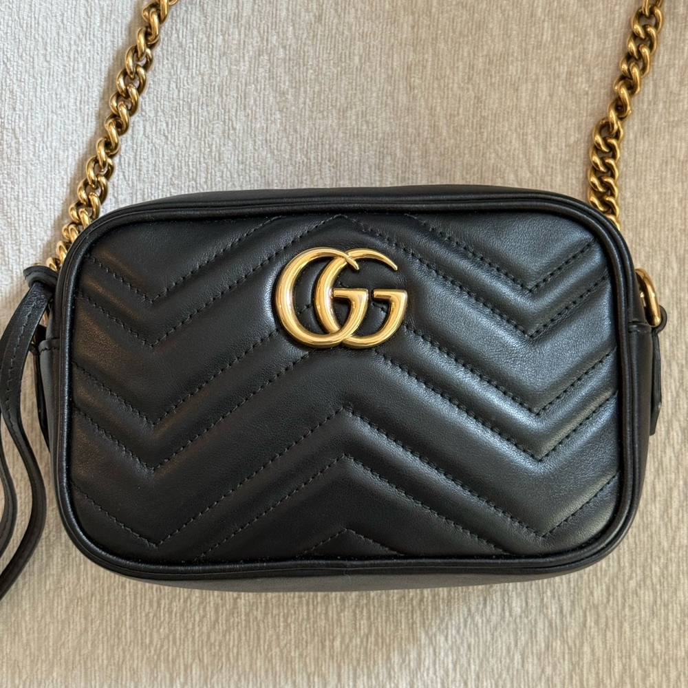 Black Gucci Marmont Mini Camera Bag
Quilted Leather Crossbody Bag